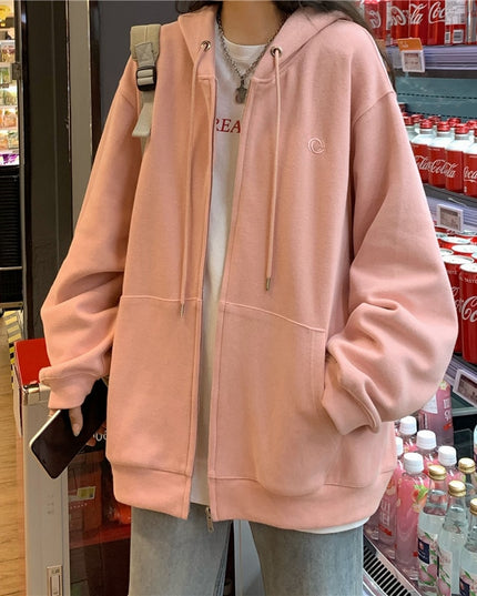 Damska bluza oversize rozpinana z kapturem i kieszeniami