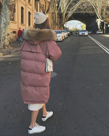 Damska kurtka zimowa ocieplana z kapturem długości przed kolano