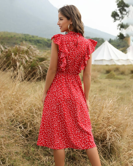 Letnia sukienka midi z falbankami w drobne wzory