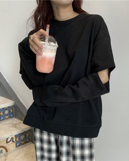 Damska bluza z rozcięciami na rękawach