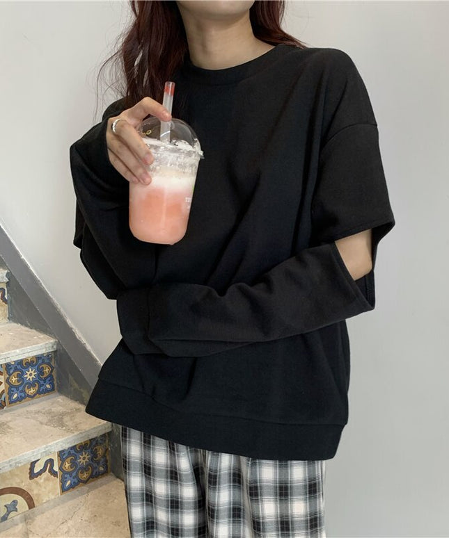 Damska bluza z rozcięciami na rękawach