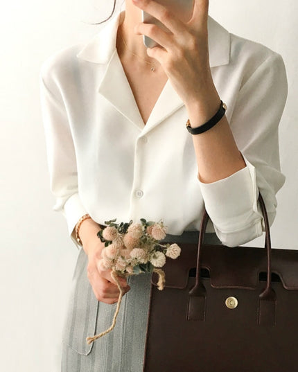 Damska koszula o klasycznym kroju