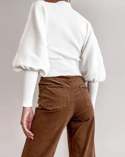 Damski sweter z golfem i bufiastymi rękawami