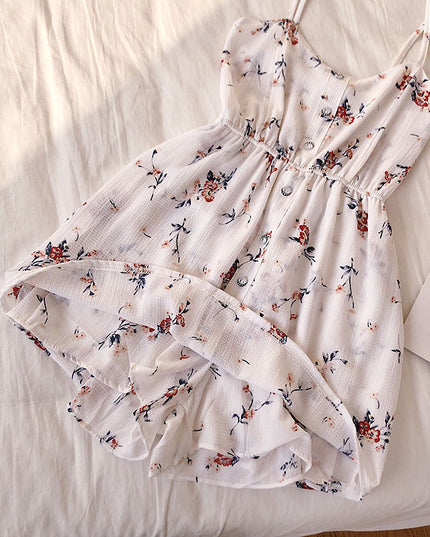 Damski kombinezon w kwiaty na cienkich ramiączkach