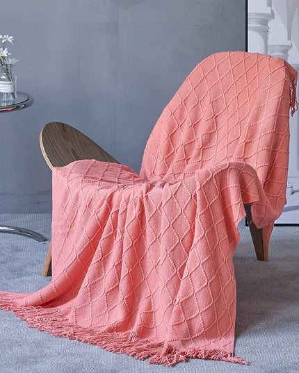 Koc z frędzlami i fakturą w romby