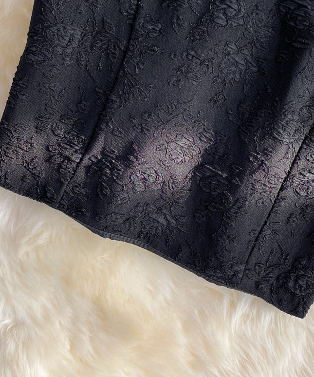 Damski top z fakturą w kwiaty