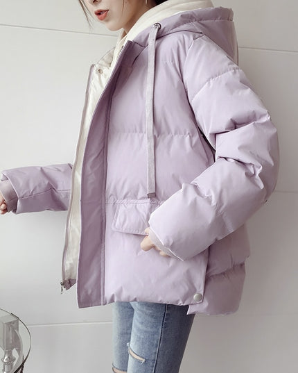 Damska kurtka zimowa z kapturem i kieszeniami