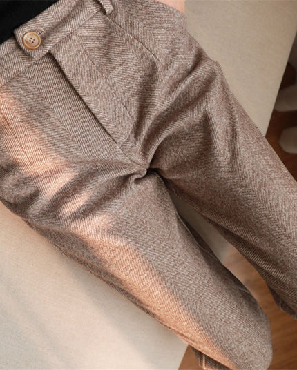 Damskie spodnie eleganckie w jodełkę