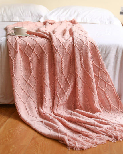 Koc z frędzlami i fakturą w romby