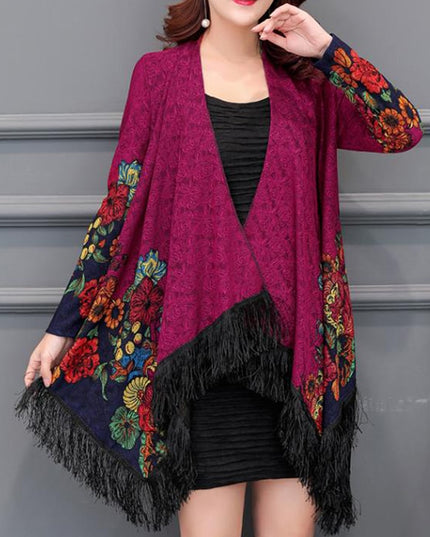 Damski sweter typu ponczo z frędzlami i haftem