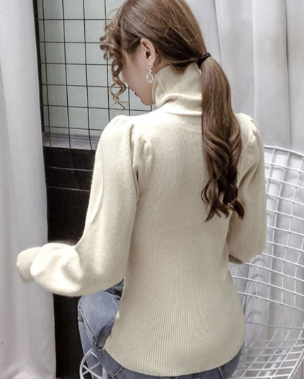 Damski sweter z golfem i bufiastymi rękawami