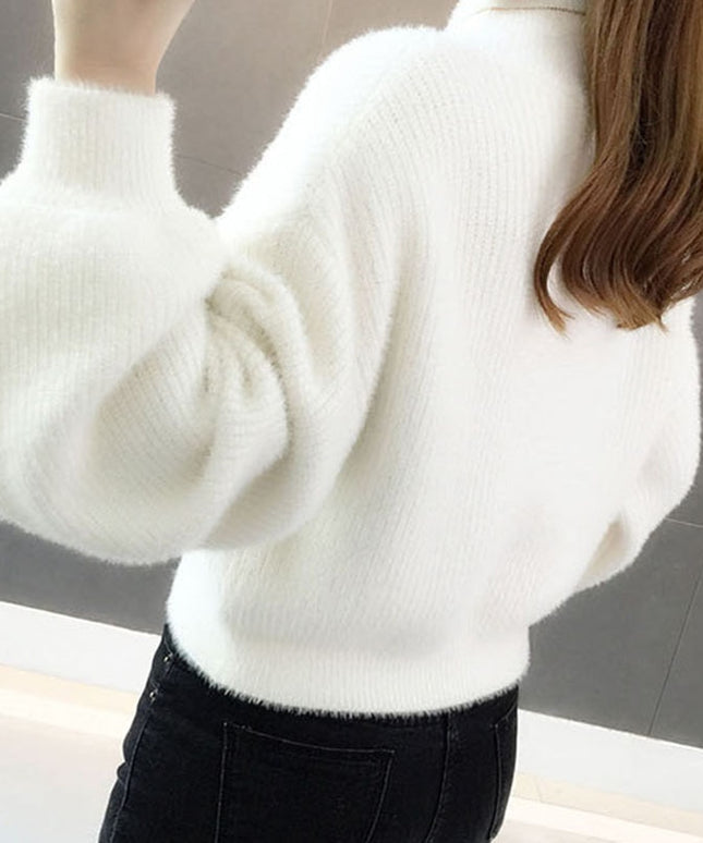 Damski sweter oversize z golfem