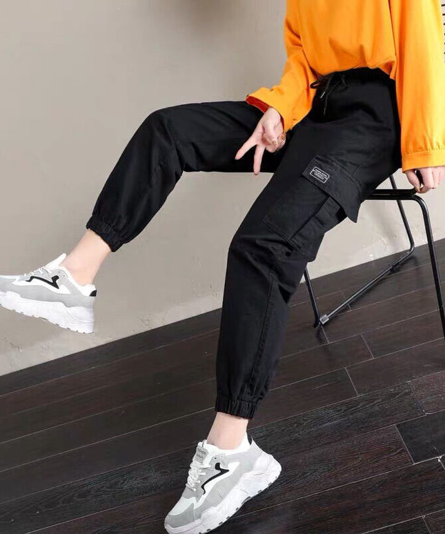 Damskie spodnie cargo ze ściągaczami i wiązaniem