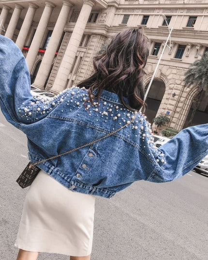 Damska kurtka jeansowa ze zdobieniem na plecach