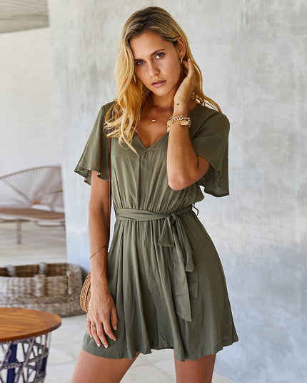 Damski kombinezon z krótkim rękawem i wiązaniem w talii