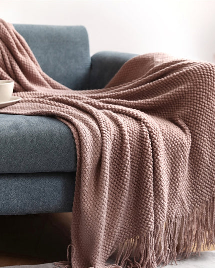 Dzianinowy koc z plecioną fakturą