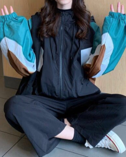 Damska kurtka przejściowa przeciwdeszczowa z kapturem o luźnym kroju