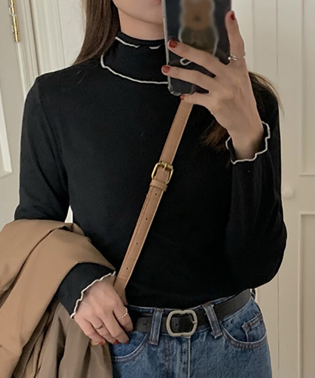 Damska koszulka z długim rękawem z golfem i falbanką