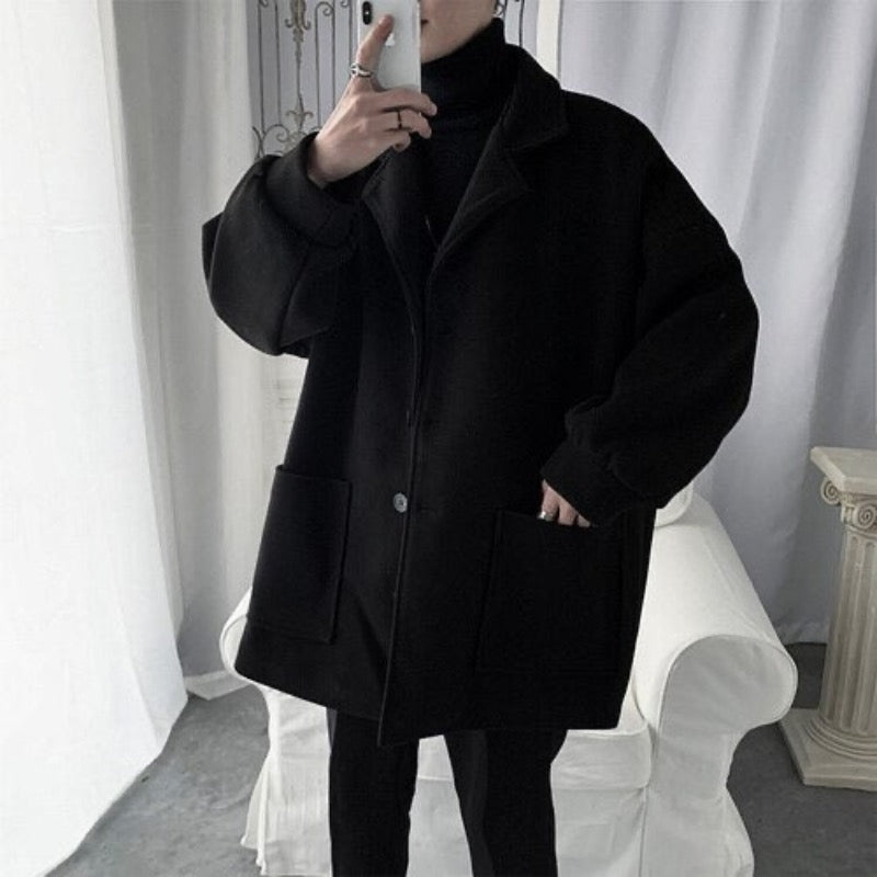 Męski płaszcz jednorzędowy oversize z kieszeniami