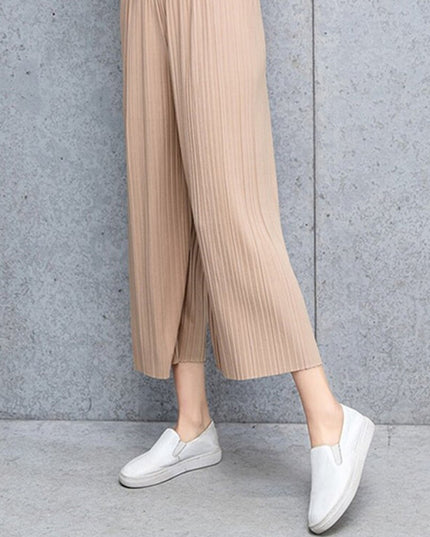 Damskie spodnie materiałowe długości 7/8