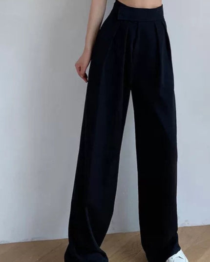 Damskie spodnie materiałowe taliowane z szerokimi nogawkami