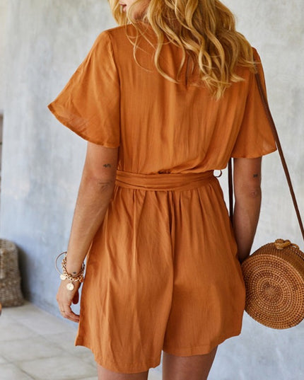 Damski kombinezon z krótkim rękawem i wiązaniem w talii