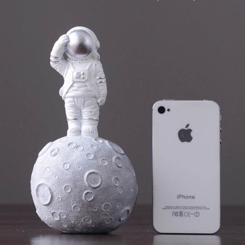 Figurka funkcjonalna astronauta uchwyt na telefon