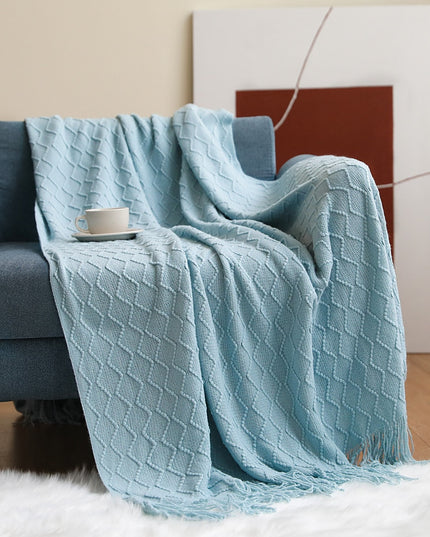 Koc z frędzlami i fakturą w romby