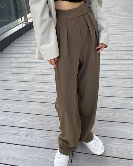 Damskie spodnie materiałowe taliowane z szerokimi nogawkami
