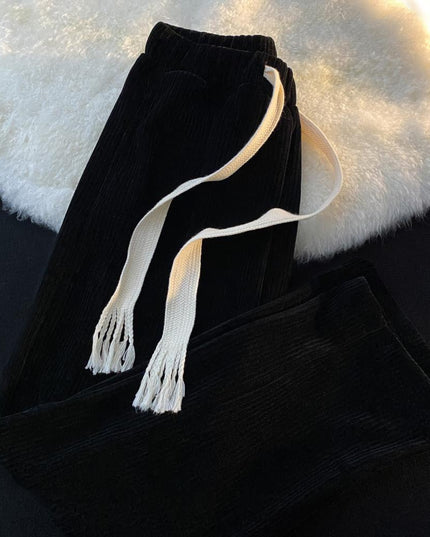 Damskie spodnie materiałowe z wiązaniem