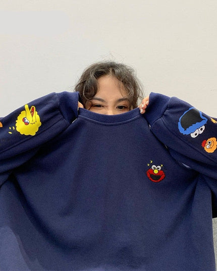 Damska bluza crewneck z nadrukami z ulicy sezamkowej