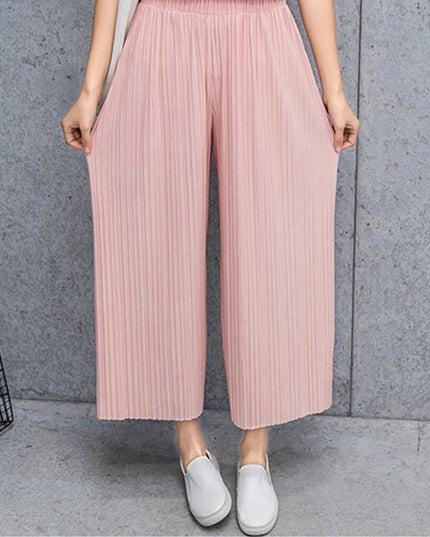 Damskie spodnie materiałowe długości 7/8