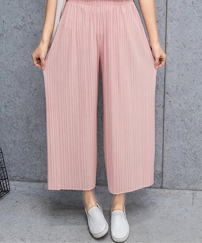 Damskie spodnie materiałowe długości 7/8