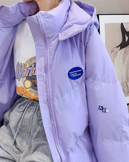 Damska kurtka zimowa oversize z kapturem