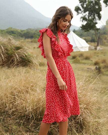 Letnia sukienka midi z falbankami w drobne wzory