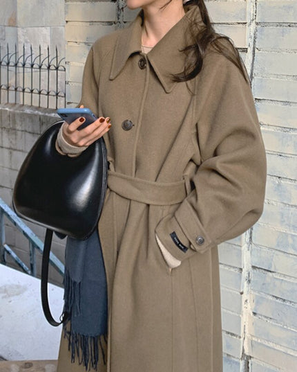 Damski długi płaszcz z wiązaniem w talii