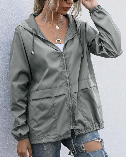 Damska kurtka przejściowa z kapturem wiązana w talii