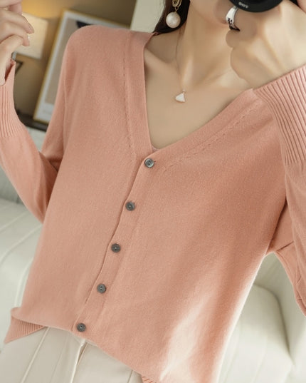 Damski sweter typu kardigan zapinany na guziki