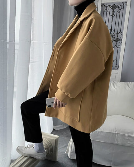 Męski płaszcz jednorzędowy oversize z kieszeniami