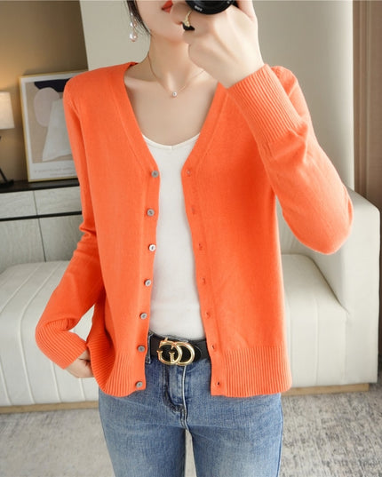 Damski sweter typu kardigan zapinany na guziki