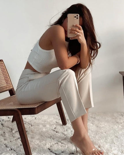 Damskie spodnie chinosy z wysokim stanem podkreślające talię