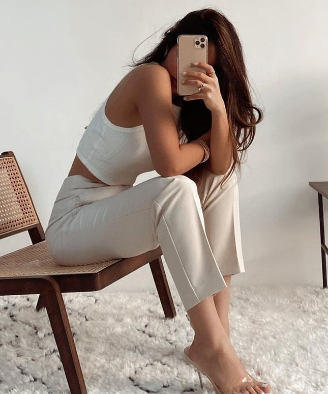 Damskie spodnie chinosy z wysokim stanem podkreślające talię