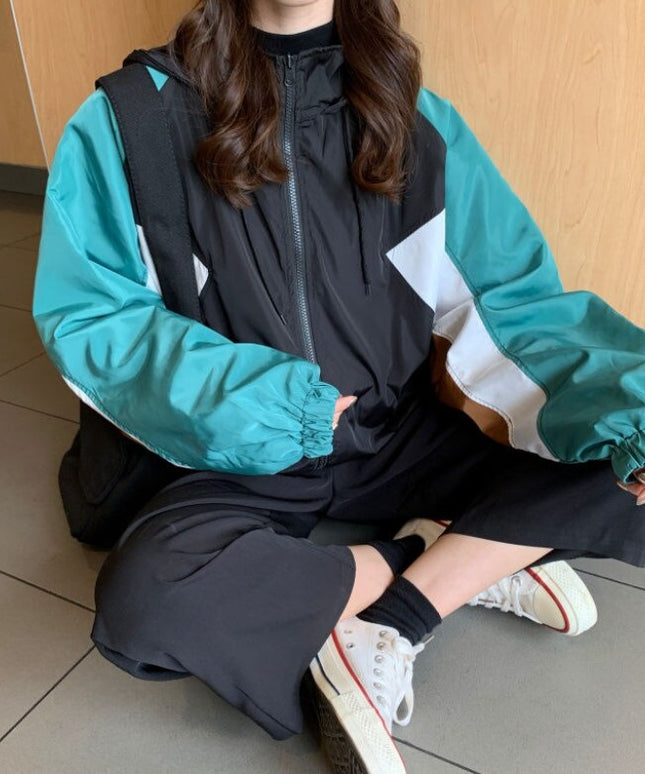 Damska kurtka przejściowa przeciwdeszczowa z kapturem o luźnym kroju