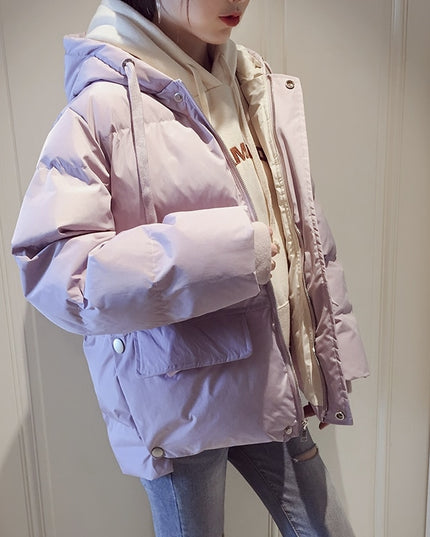 Damska kurtka zimowa z kapturem i kieszeniami