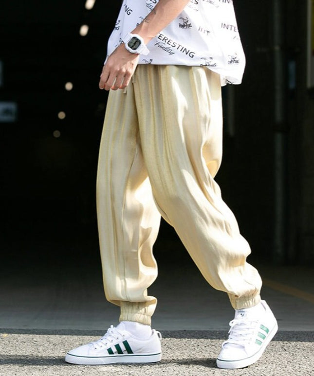 Męskie spodnie treningowe z połyskującej tkaniny