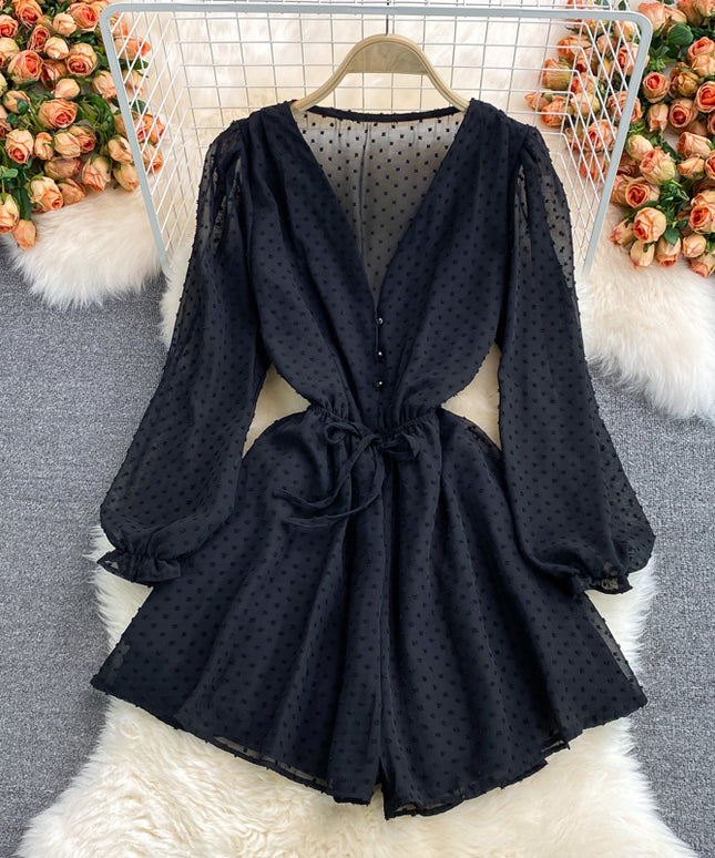 Damski kombinezon z długim rękawem i wiązaniem w talii