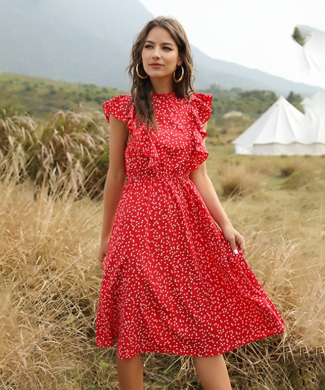 Letnia sukienka midi z falbankami w drobne wzory