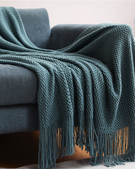 Dzianinowy koc z plecioną fakturą