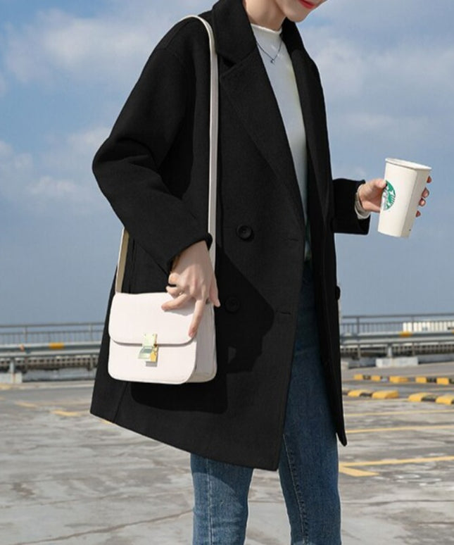 Damski płaszcz zimowy dwurzędowy