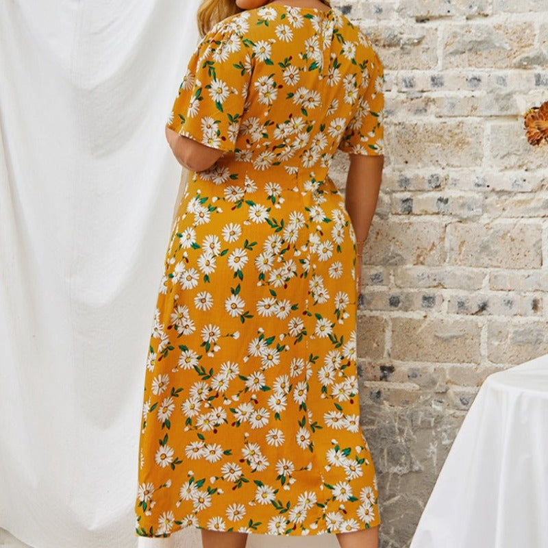 Sukienka plus size z rozcięciem
